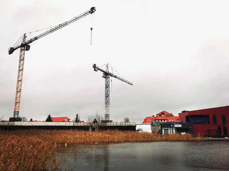 budowa budynków apartamentowych w Mikołajkach